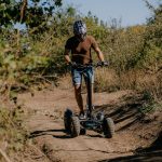 Ground tee and carabiner wheels, carnation on nature trail.